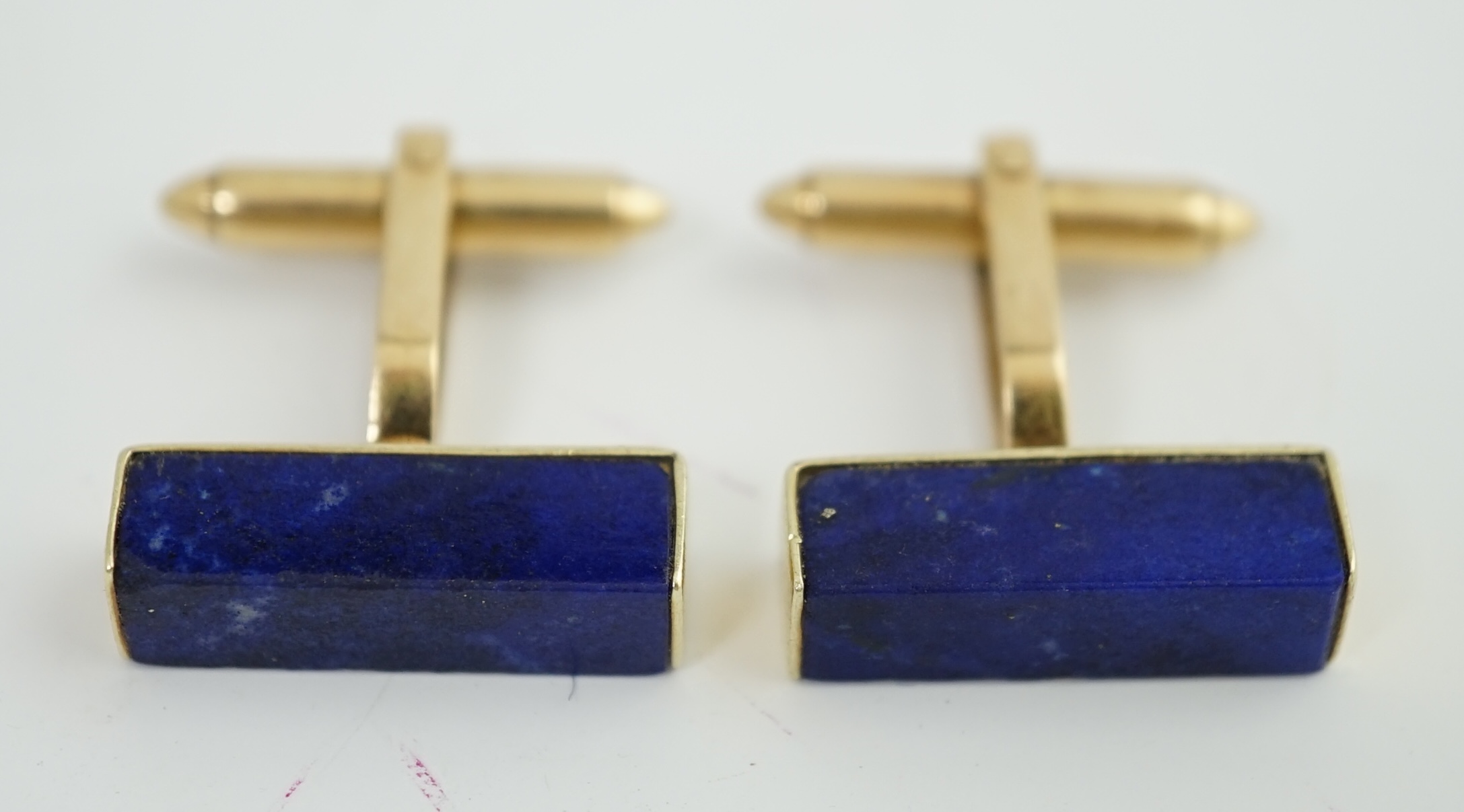 A pair of mid to late 20th century 14k gold and lapis lazuli set cufflinks